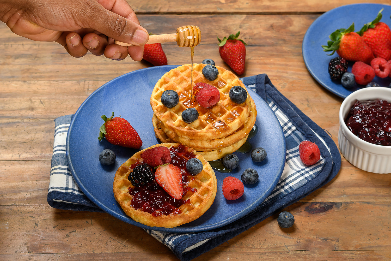 Fresh waffles with berries and honey at Pelican Bistro